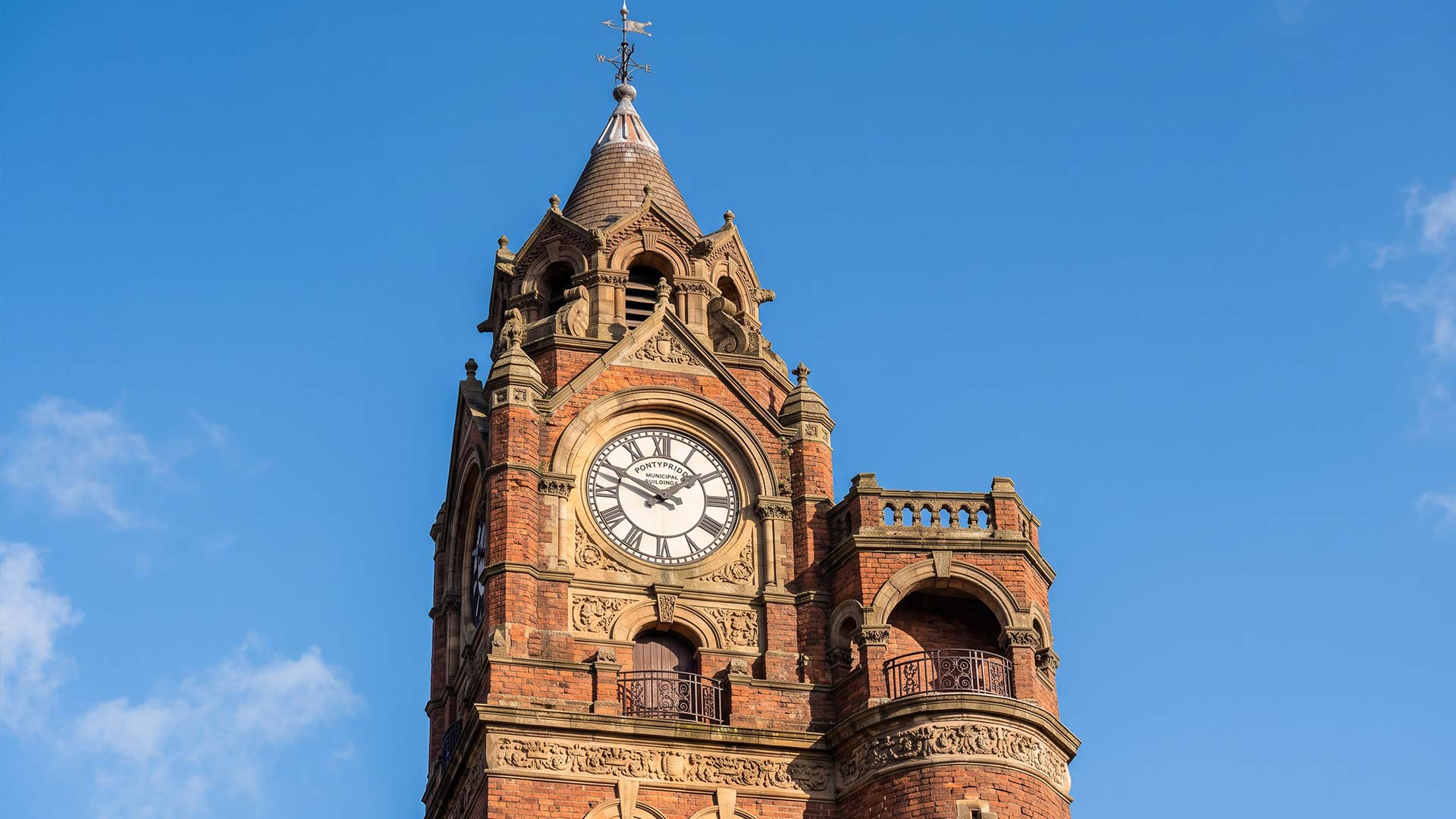 Clock tower and Victorian craftsmans
